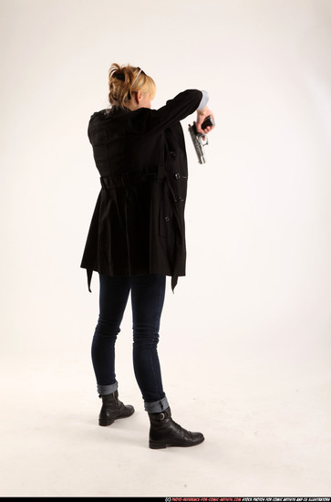 Woman Adult Athletic White Fighting with gun Standing poses Coat