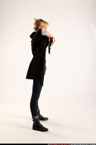 Woman Adult Athletic White Fighting with gun Standing poses Coat