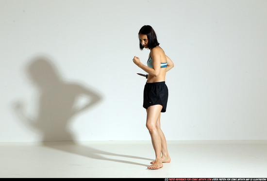 Woman Young Athletic White Fighting with knife Moving poses Casual