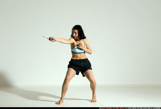 Woman Young Athletic White Fighting with knife Moving poses Casual