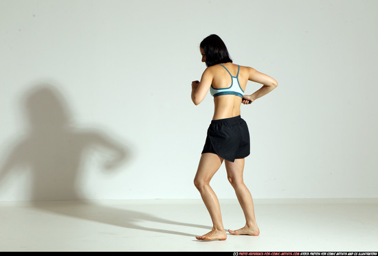 Woman Young Athletic White Fighting with knife Moving poses Casual