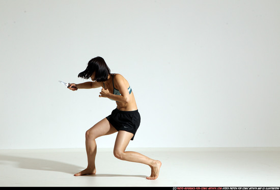 Woman Young Athletic White Fighting with knife Moving poses Casual