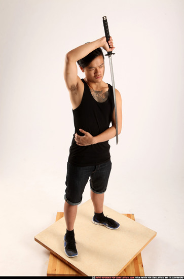 Man Young Athletic Fighting with sword Standing poses Casual Asian