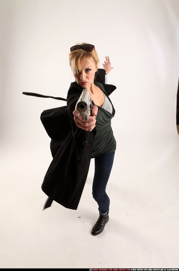 Woman Adult Athletic White Fighting with gun Standing poses Coat