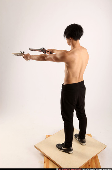 Man Young Athletic Fighting with gun Standing poses Pants Asian