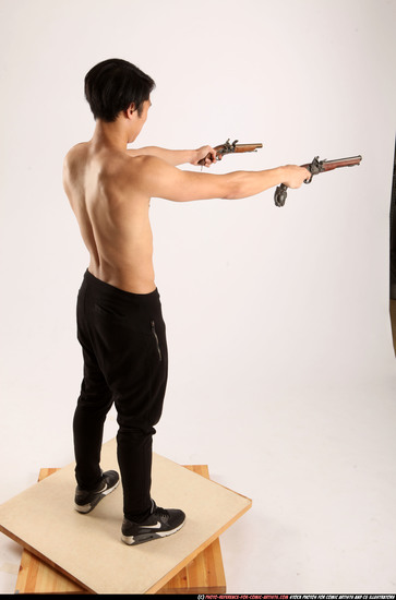 Man Young Athletic Fighting with gun Standing poses Pants Asian