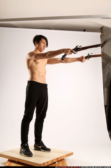 Man Young Athletic Fighting with gun Standing poses Pants Asian