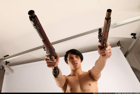 Man Young Athletic Fighting with gun Standing poses Pants Asian