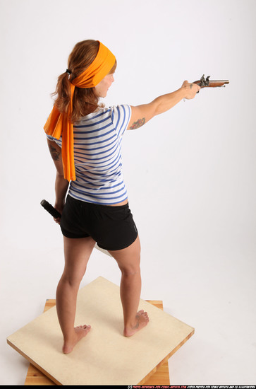 Woman Adult Athletic White Fighting with gun Standing poses Army