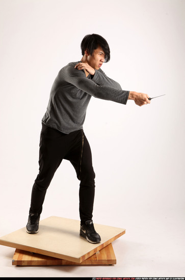 Man Young Athletic Fighting with knife Standing poses Casual Asian