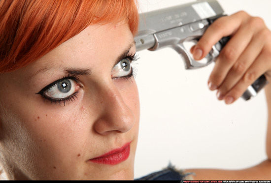 Woman Adult Athletic White Fighting with gun Standing poses Casual