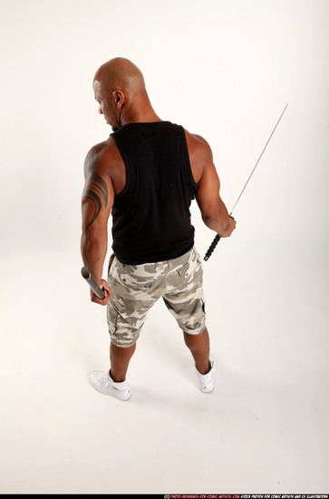 Man Adult Athletic Black Fighting with sword Standing poses Army