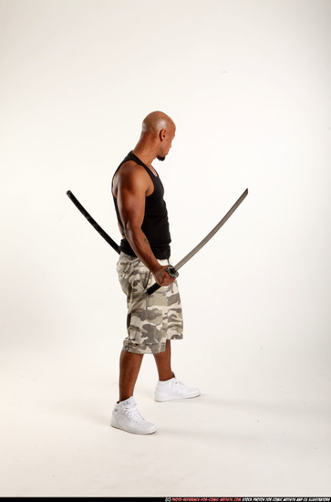 Man Adult Athletic Black Fighting with sword Standing poses Army