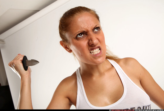 Woman Adult Athletic White Fighting with knife Standing poses Casual