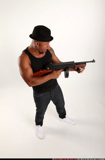 Man Adult Athletic Black Fighting with submachine gun Standing poses Casual