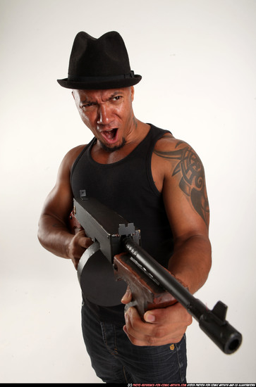 Man Adult Athletic Black Fighting with submachine gun Standing poses Casual