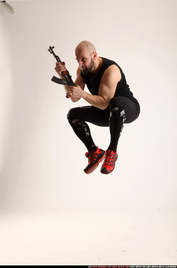 Man Adult Athletic White Fighting with submachine gun Moving poses Sportswear