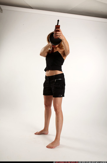 Woman Adult Athletic White Fighting with submachine gun Standing poses Casual