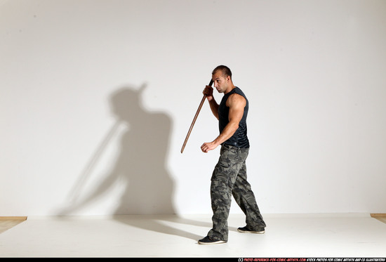 Man Adult Athletic White Fighting with sword Moving poses Casual