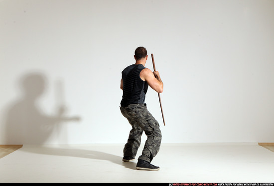 Man Adult Athletic White Fighting with sword Moving poses Casual