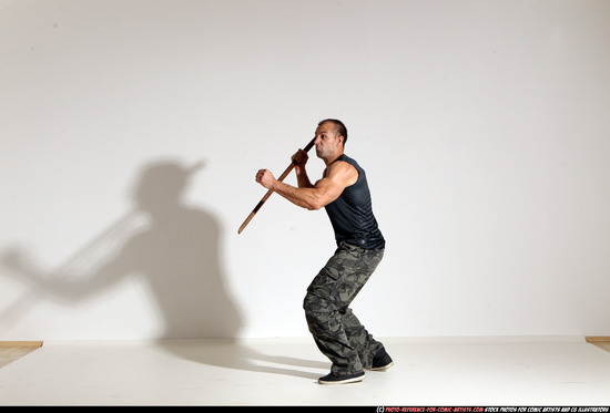 Man Adult Athletic White Fighting with sword Moving poses Casual