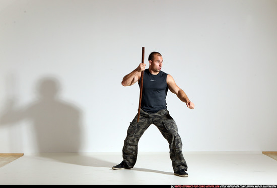 Man Adult Athletic White Fighting with sword Moving poses Casual