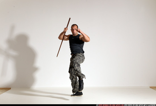 Man Adult Athletic White Fighting with sword Moving poses Casual