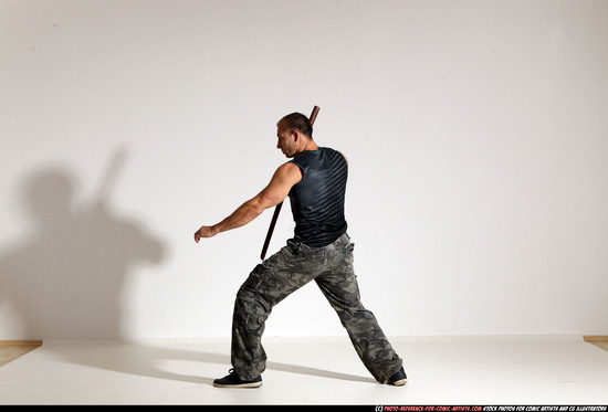 Man Adult Athletic White Fighting with sword Moving poses Casual