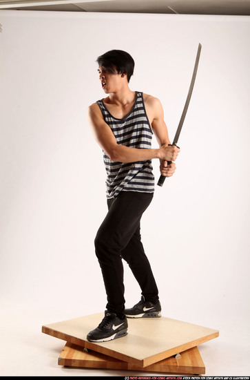 Man Young Athletic Fighting with sword Standing poses Casual Asian