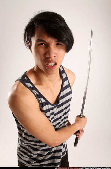 Man Young Athletic Fighting with sword Standing poses Casual Asian