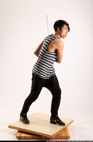 Man Young Athletic Fighting with sword Standing poses Casual Asian