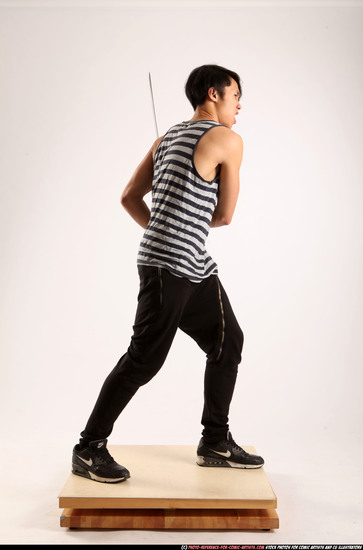 Man Young Athletic Fighting with sword Standing poses Casual Asian