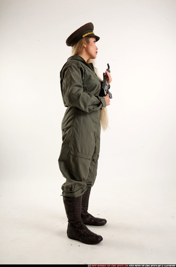 Woman Young Average Fighting with submachine gun Standing poses Army Asian