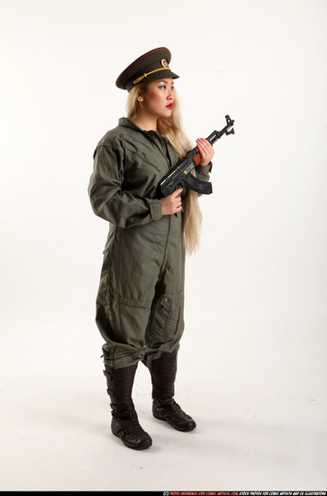 Woman Young Average Fighting with submachine gun Standing poses Army Asian