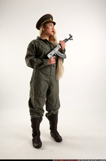 Woman Young Average Fighting with submachine gun Standing poses Army Asian