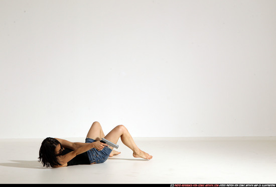 Woman Young Athletic White Fighting with gun Moving poses Casual