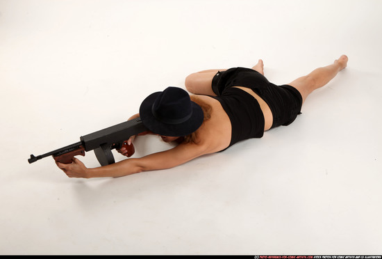 Woman Adult Athletic White Fighting with submachine gun Laying poses Casual