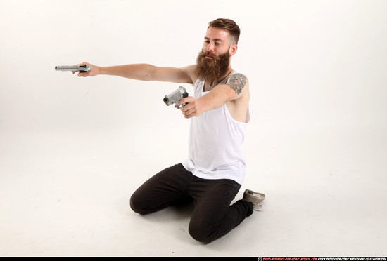 Man Adult Athletic White Fighting with gun Kneeling poses Casual