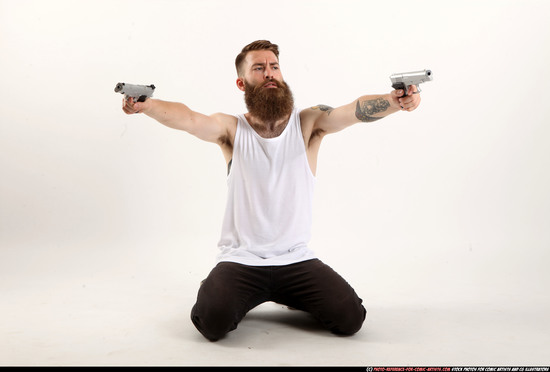 Man Adult Athletic White Fighting with gun Kneeling poses Casual