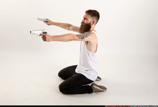 Man Adult Athletic White Fighting with gun Kneeling poses Casual