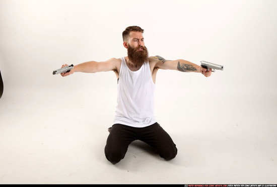 Man Adult Athletic White Fighting with gun Kneeling poses Casual