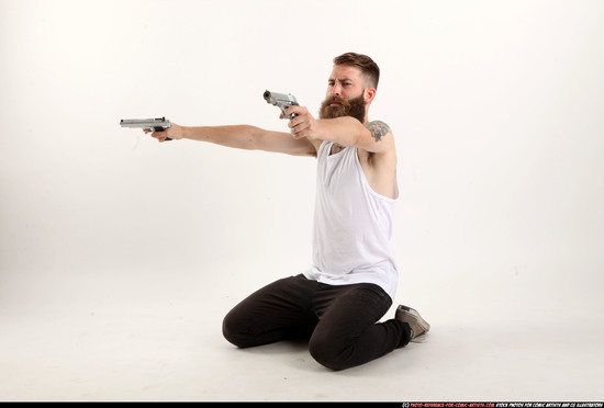 Man Adult Athletic White Fighting with gun Kneeling poses Casual