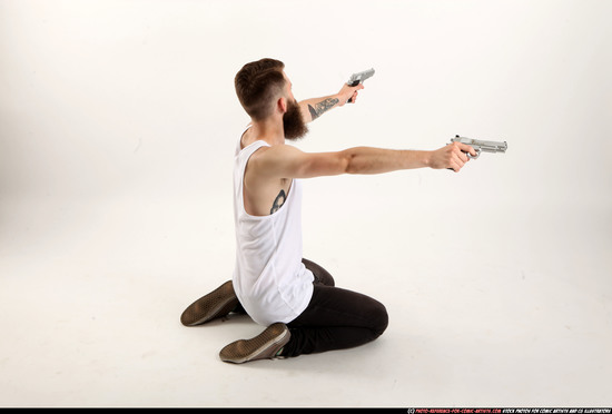 Man Adult Athletic White Fighting with gun Kneeling poses Casual