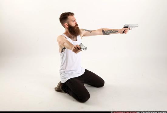 Man Adult Athletic White Fighting with gun Kneeling poses Casual