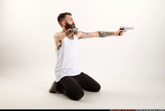 Man Adult Athletic White Fighting with gun Kneeling poses Casual