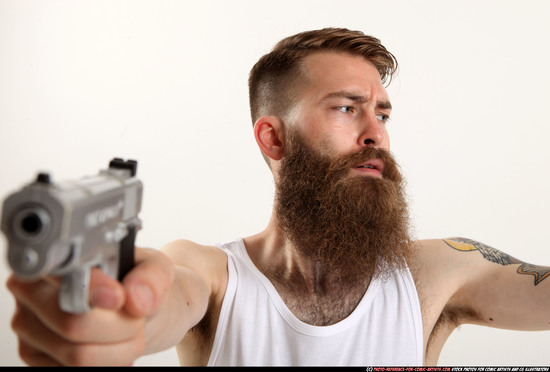 Man Adult Athletic White Fighting with gun Kneeling poses Casual