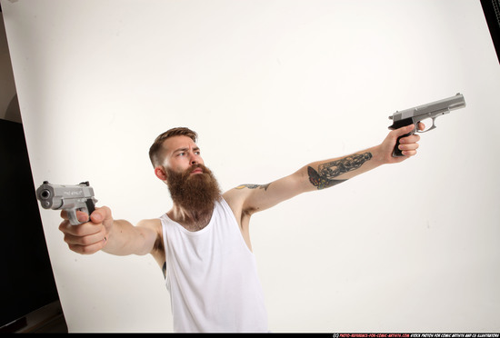 Man Adult Athletic White Fighting with gun Kneeling poses Casual