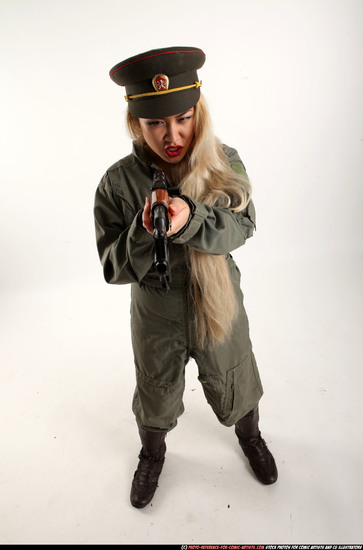 Woman Young Average Fighting with submachine gun Standing poses Army Asian