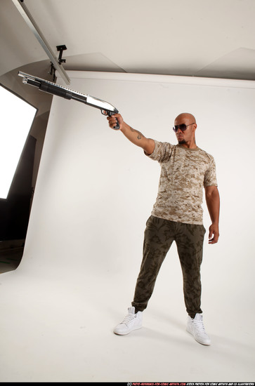 Man Adult Athletic Black Standing poses Army Fighting with shotgun