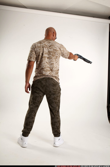 Man Adult Athletic Black Standing poses Army Fighting with shotgun